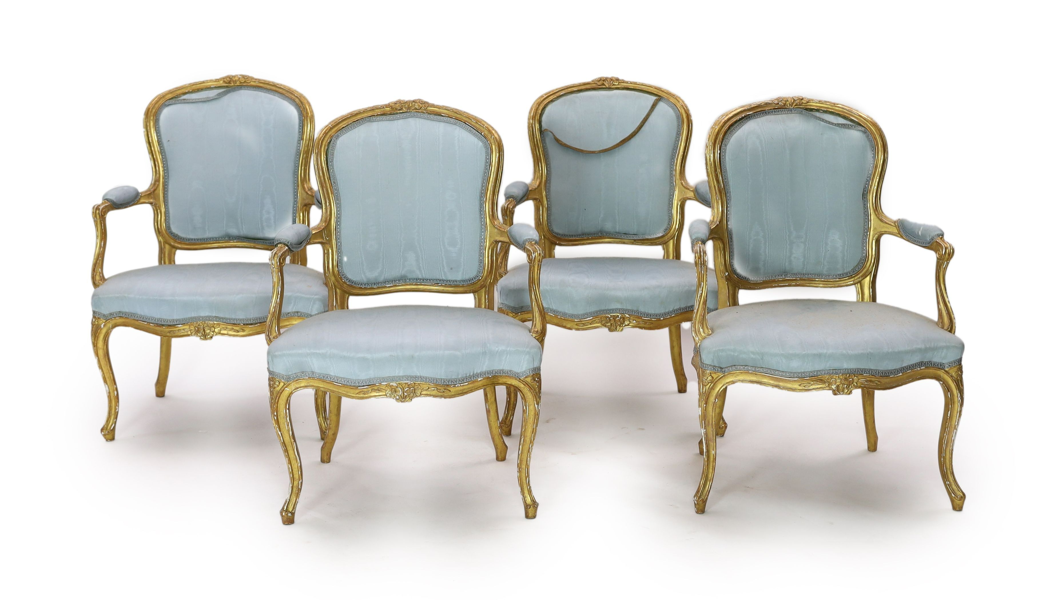 A set of four Louis XVI carved giltwood fauteuils, W.65cm D.62cm H.93cm